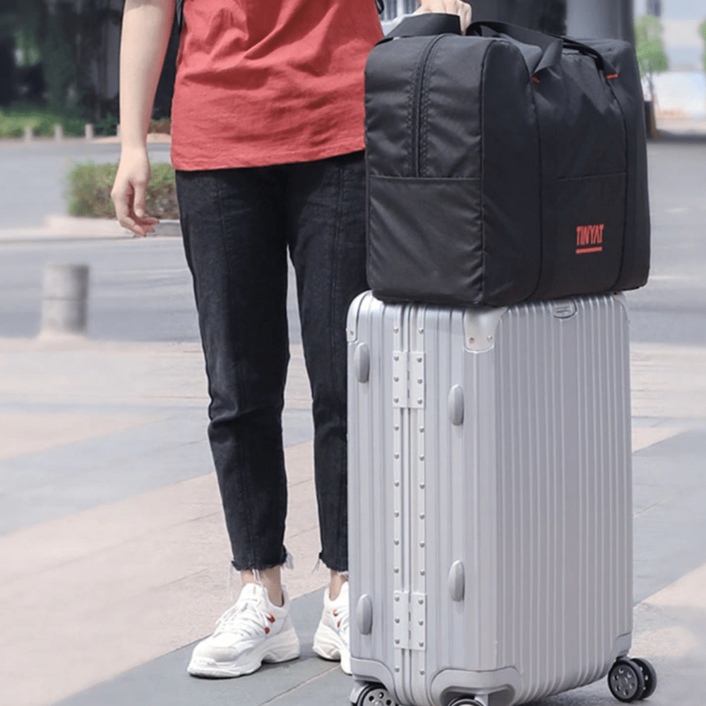 Sac pliable et imperméable adaptable sur une valise