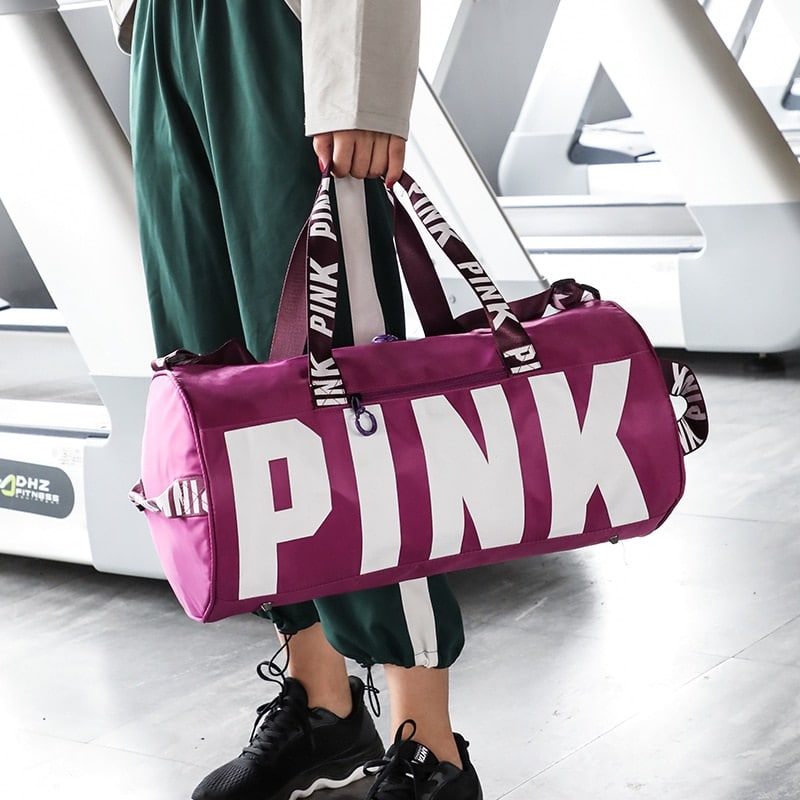 Sac de voyage “PINK” en nylon pour femme à bandoulière