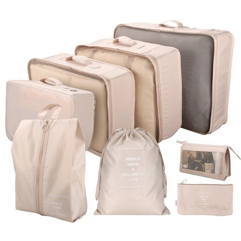 Set de sac de rangement de couleur beige avec 2 sac à dos et 2 trousses de toilettes