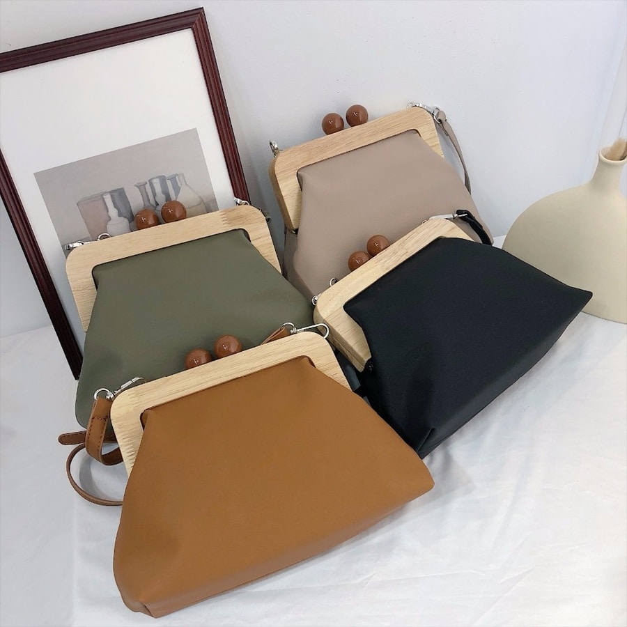 Collection de sac à bandoulière avec clip en bois design styliste
